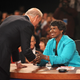 Ifill greeting Joe Biden at the 2008 vice presidential debate. Image via Getty.
